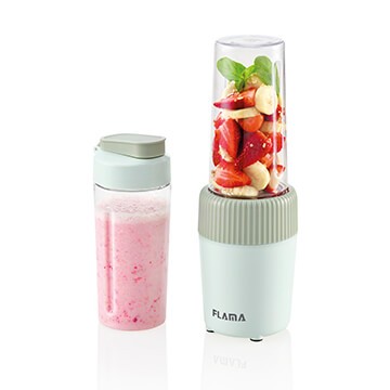 Liquidificadora verde para um toque mais moderno e com frutas lá dentro prontas para serem transformadas em um smoothie apetitoso..