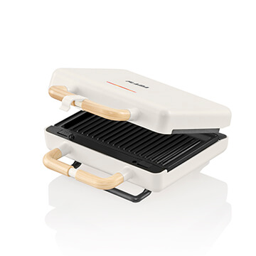 Torradeira bege para um toque mais moderno e clean com placas substituíveis para preparação de outras refeições.